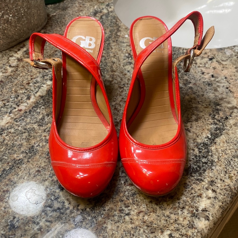 Bight orange patent pumps